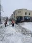 Кадры работ по уборке снега