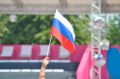 Женщина среди ночи украла с крыльца магазина флаги России и Якутии